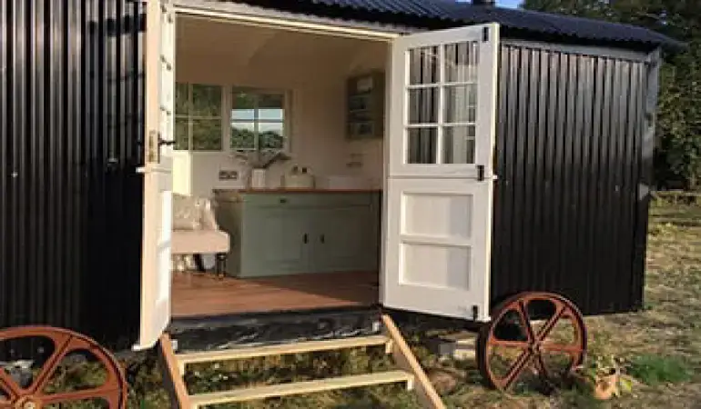 Discover the Allure of Glamping and Camping in Shepherd Huts